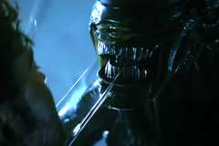 A Xenomorph attacking a human, teeth-first, in Alien: Earth